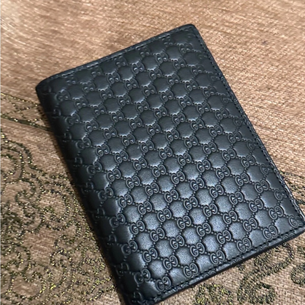 SOLD | Gucci Guccissima Black Leather Passport Holder